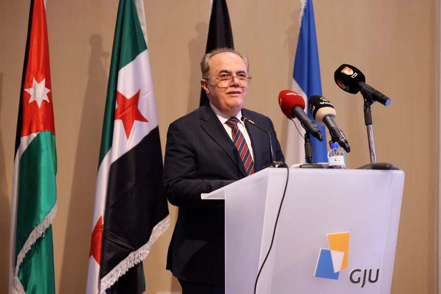Syrian Minister of Higher Education delivering remarks during the public opening session